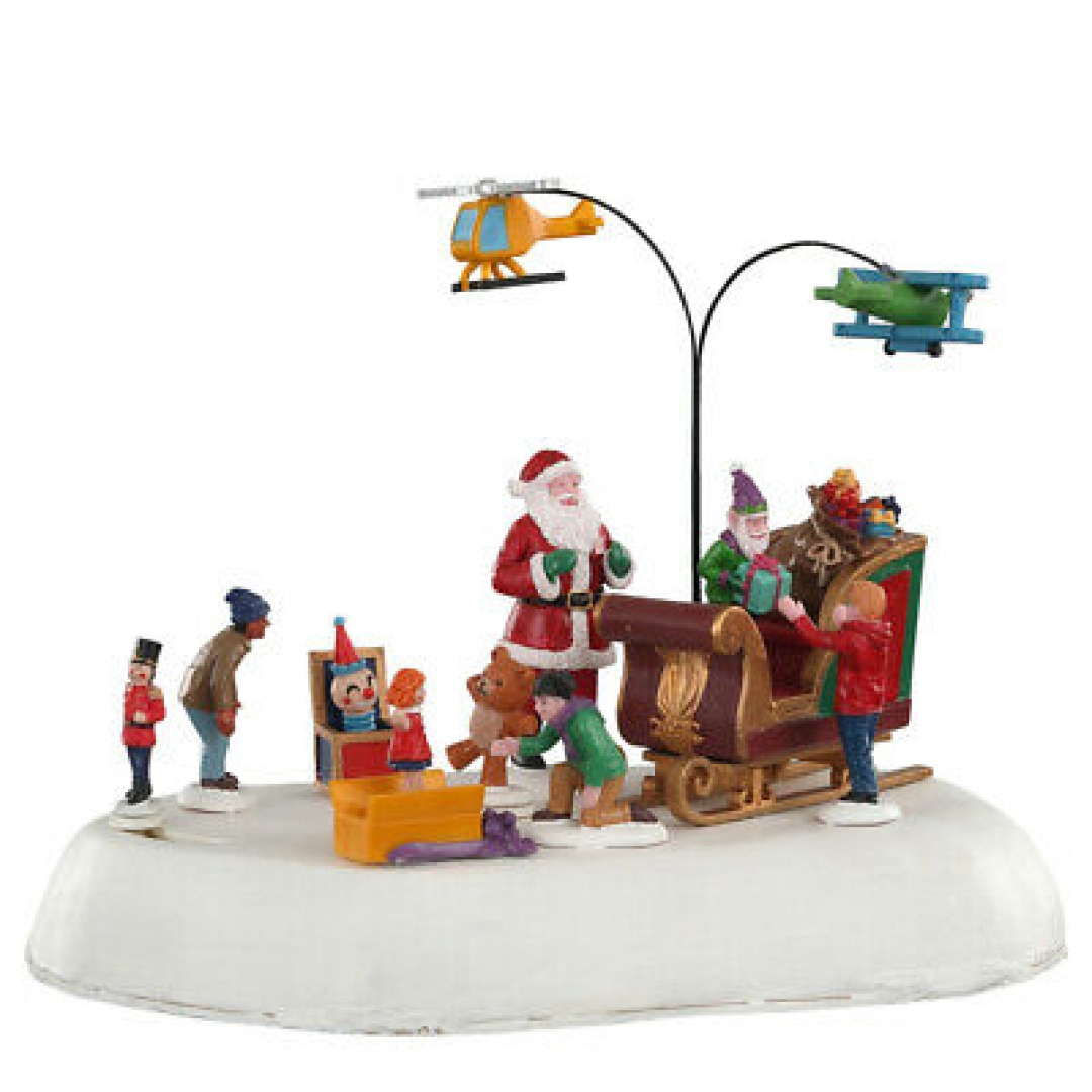 23837c5f6fa177f3aa86a860a2870ce9.jpg Lemax 04723 Multicolored Jolly Toys Santa & Children Christmas Village - Image 1