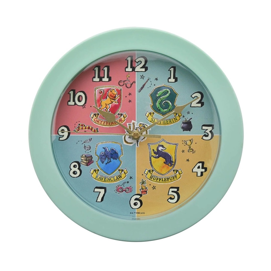 866bd658c2f69913573dcc2111ce532a.jpg Harry Potter The Four Houses Glow In The Dark Wall Clock - Image 1