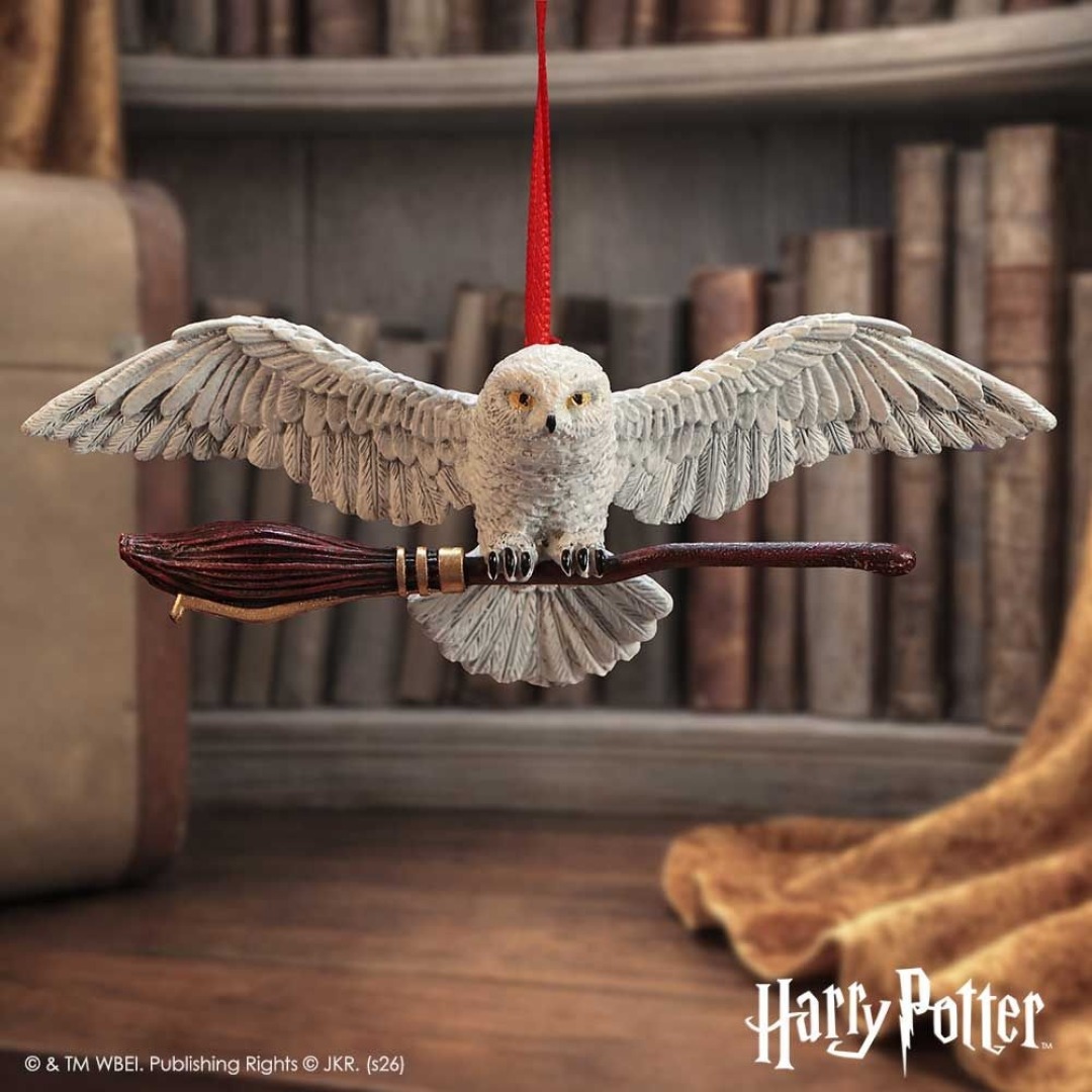 686112e3387197edbd99905ff24f9ae1.jpg Harry Potter Hedwig in Flight Hanging Ornament - Image 1